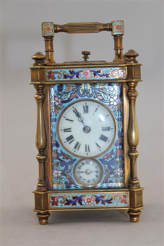 A late 19th century French gilt brass and champleve enamel hour repeating carriage alarum clock, 4.75in., with travelling case